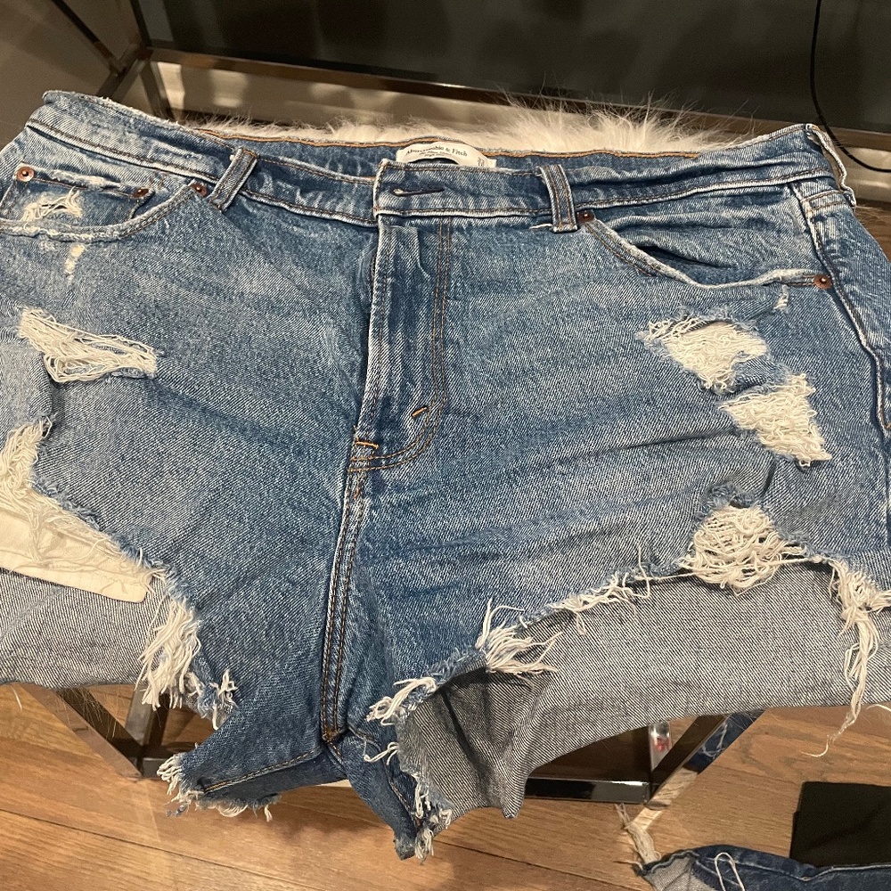 Distressed Abercrombie blue jeans